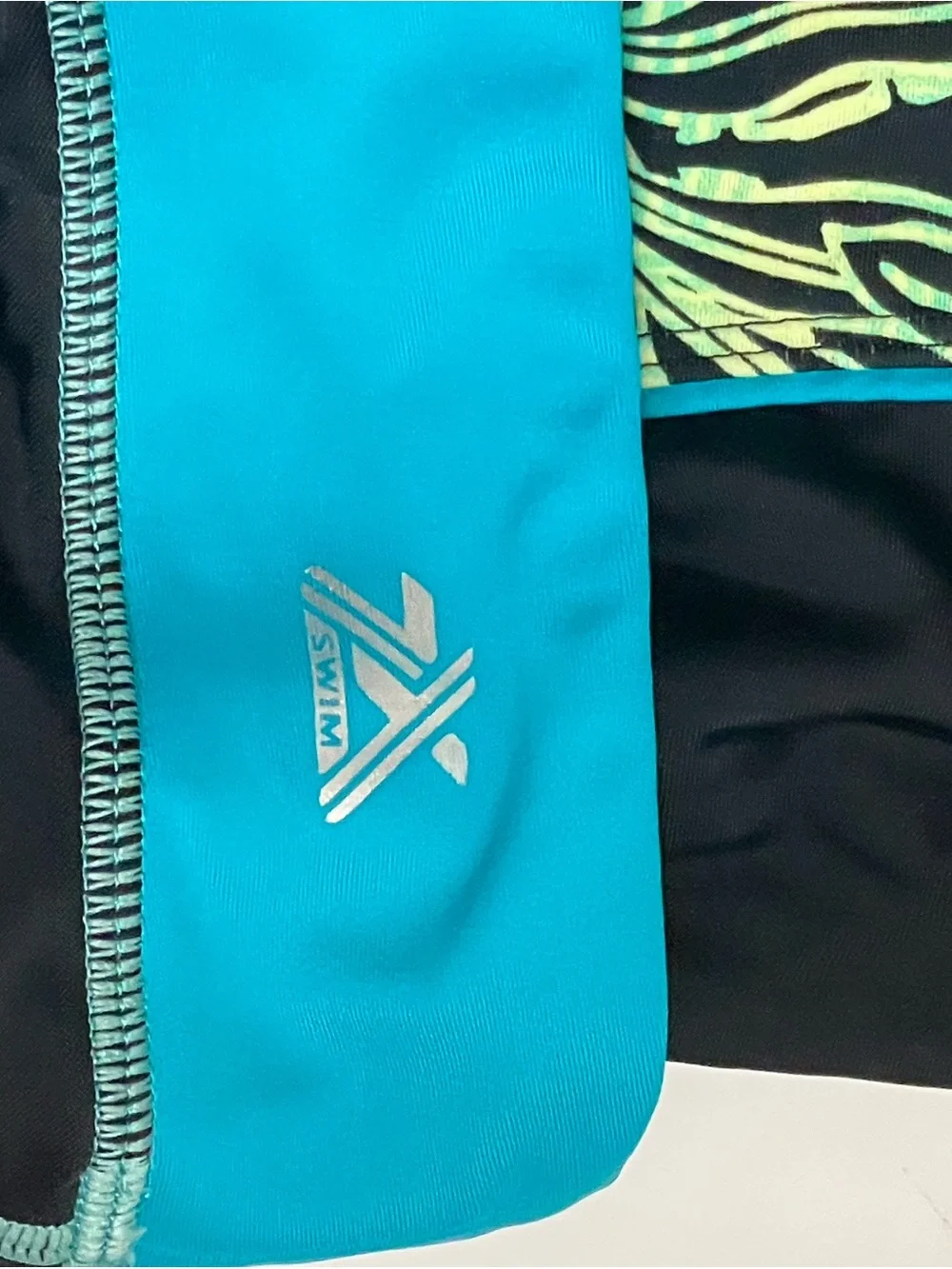ZeroXposur Black One-Piece Swim with skirt and Teal and Lime Floral Front